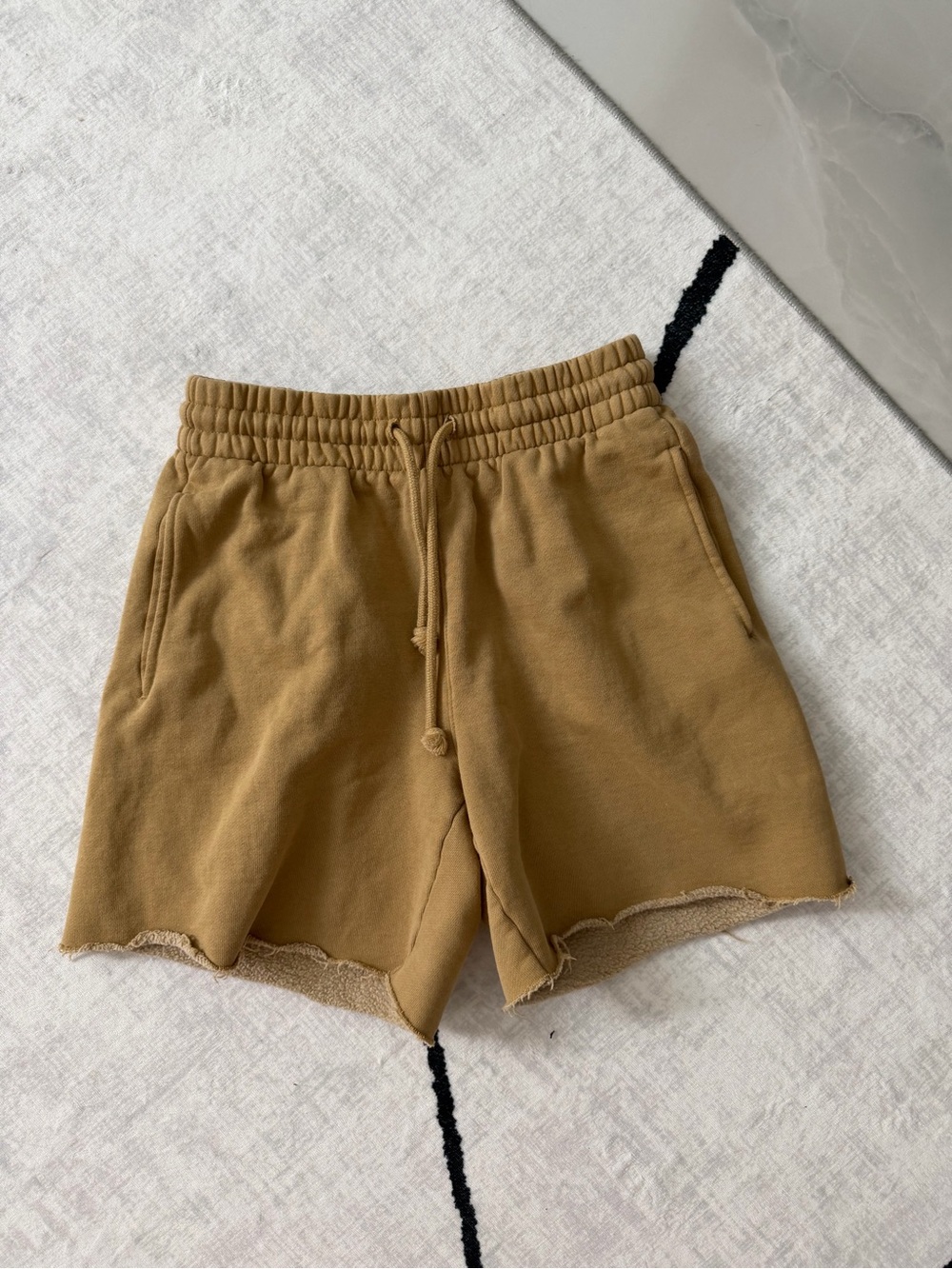 Aritzia TNA CozyAF Fleece Women’s Shorts in Tan